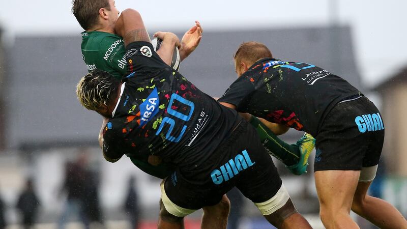 Connacht’s Jack Carty is tackled high by Jimmy Tuivaiti of Zebre. Photo: Tommy Dickson/Inpho