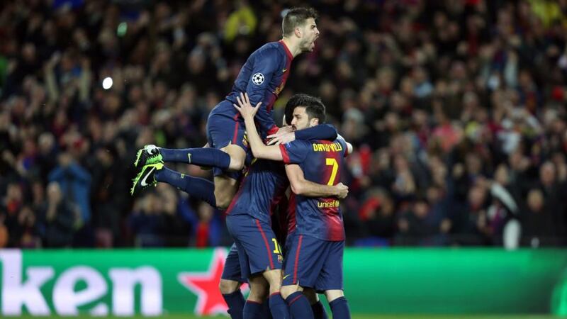 Barcelona players celebrate after Lionel Messi scored the opening goal. Photo: AOP.Press/Corbis via Getty Images