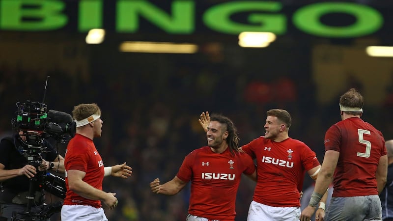 Wales players celebrate the Six Nations win over England   at the Principality stadium in round three. Photograph: Geoff Caddick/AFP/Getty Images