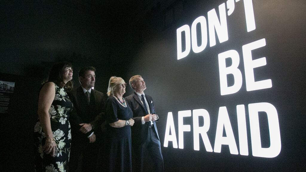 Seamus Heaney’s children Catherine, Chris and Mick, and the poet’s widow, Marie Heaney at a piece by artist Maser, Don’t Be Afraid. Photograph: Gareth Chaney/Collins