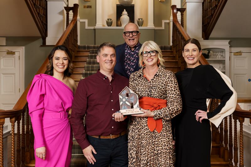 Home of the Year winners Amy and Eoin Martin (centre) with judges Siobhan Lam, Hugh Wallace and Amanda Bone