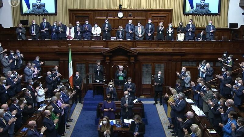 TDs, Senators and foreign diplomats stand to applause Volodymyr Zelenskiy in the Dáil chamber in April 2022. Photograph: Oireachtas TV