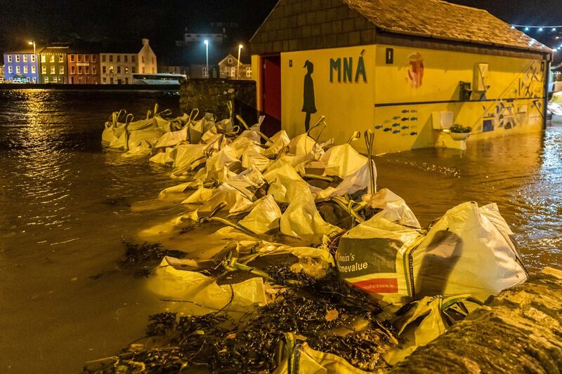 Sandbags are piled up in the Co Cork town of Bantry, which flooded after Storm Barra hit Ireland with disruptive winds, heavy rain and snow. Photograph: Andy Gibson/PA Wire