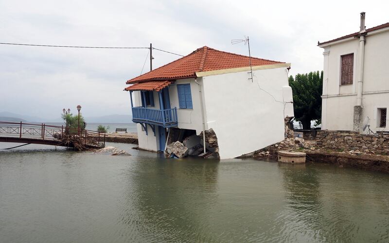 A flood damaged house in Greece. Photograph: Thodoris Nikolaou/AP