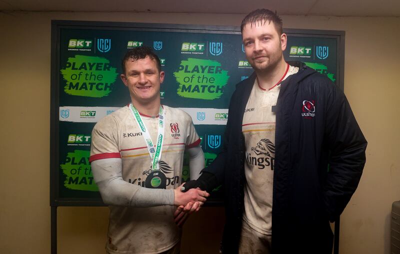 Ulster's Billy Burns is presented with the BKT player of the match award by Iain Henderson. Photograph: Laszlo Geczo/Inpho