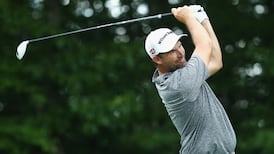 Harrington in mix at Travelers as McIlroy squeezes into weekend