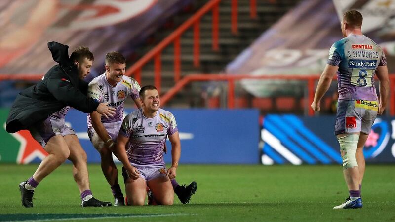Joe Simmonds and Exeter celebrate at the final whistle of their win over Racing 92. Photograph: David Rogers/Getty