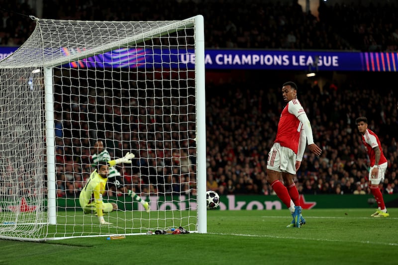 Arsenal's Gabriel Magalhaes watches Geny Catamo's shot hit the post. Photograph: Adrian Dennis/AFP via Getty Images