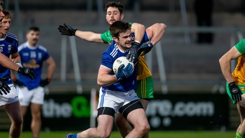 Thomas Galligan battles with Ryan McHugh durign Cavan’s Ulster final win. Photograph: Morgan Treacy/Inpho