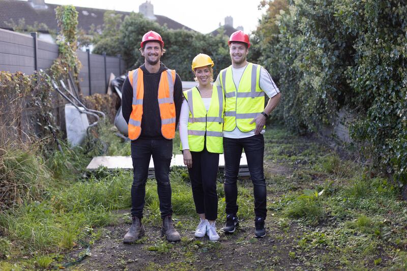 Master builder Harrison Gardner with Dublin couple Grace and Robbie, who are hoping to extend their two-bed in Dublin’s city centre. Photograph: RTE