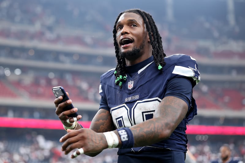 CeeDee Lamb leaves the field after a brilliant performance. Photograph: Tim Warner/Getty Images