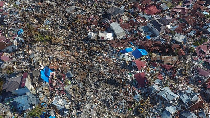 An aerial view of an area devastated by an earthquake in Palu, Central Sulawesi on Monday. Photograph:   Antara Foto/Reuters