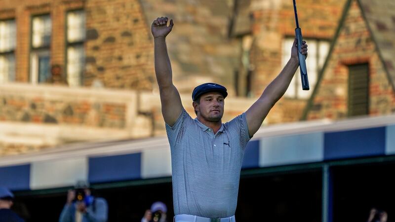 Bryson DeChambeau celebrates after sinking the winning putt at Winged Foot. Photograph:  Charles Krupa/AP