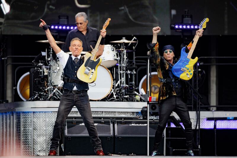 Bruce Springsteen and Steven Van Zandt on stage in at Boucher Playing Fields in Belfast. Photograph: Liam McBurney