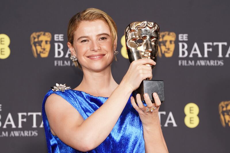 Jessie Buckley poses with the Leading Actress Award for Hamnet during the 79th Baftas. Photograph: Ian West/PA Wire