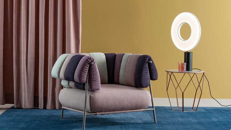 The well-cushioned Tirella is a cross between a salon seat and a lounge chair.