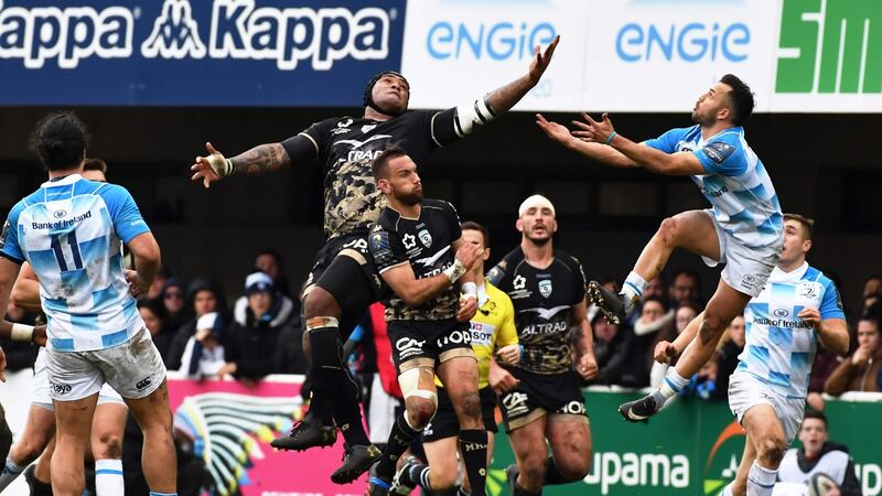 Jamison Gibson-Park challenges Nemani Nadolo for the ball. Photo: Pascal Guyot/Getty Images