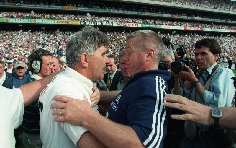 Kildare manager Mick O'Dwyer and Kerry manager Páidí Ó Sé after the 1998 All-Ireland semi-final. Photograph: Billy Stickland/Inpho