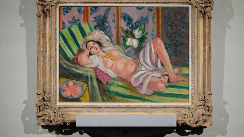 Henri Matisse’s Odalisque couchee aux magnolias  on display during an auction from the collection of Peggy and David Rockefeller  in New York. Photograph: Julie Jacobson/AP Photo