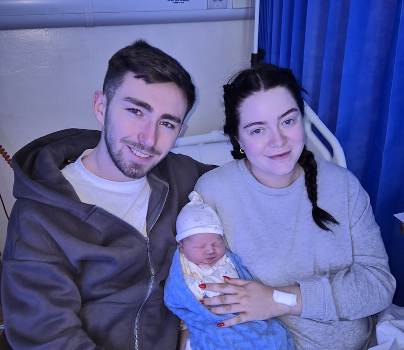 Theodore Byrne, pictured with his parents Martha Gilroy-Kelly and her partner Jack Byrne, was the first baby born in Dublin's Rotunda Hospital in 2025. Arriving at 00.09 and weighing 4.08kg, Theodore was among the first babies born in Ireland in 2025. Photograph: Rotunda Hospital Dublin