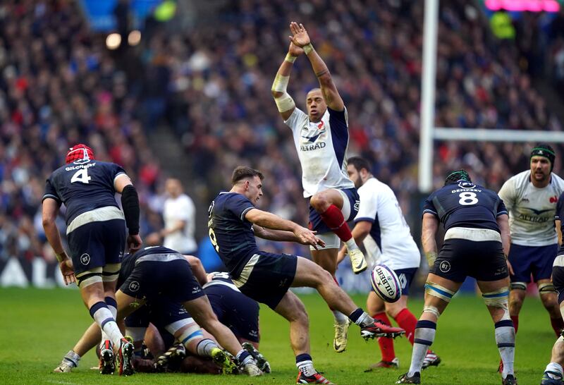 Scotland's Ben White kicks as France's Gael Fickou attempts to block during the Six Nations match at Murrayfield. Photograph: Andrew Milligan/PA

