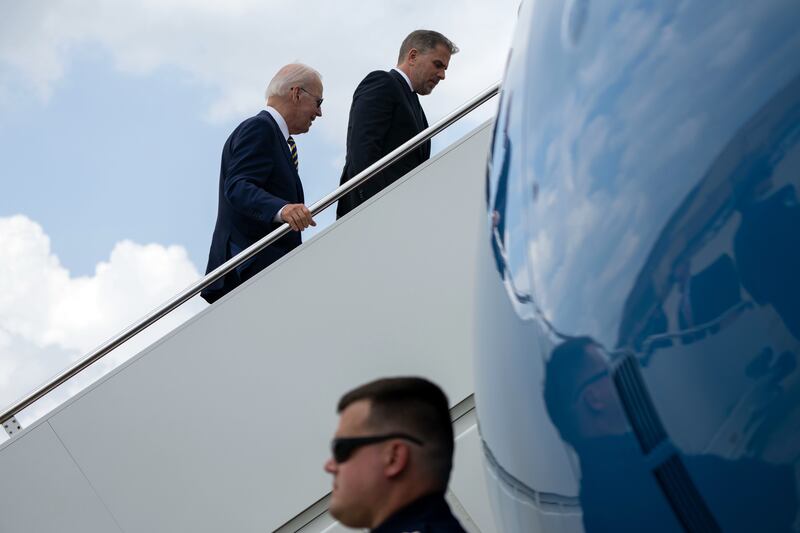President Joe Biden and his son Hunter board Air Force One at Joint Base Andrews in Maryland in August 2022. Hunter's involvement with a Ukrainian energy company has generated particular controversy. Photograph: Haiyun Jiang/The New York Times
                      