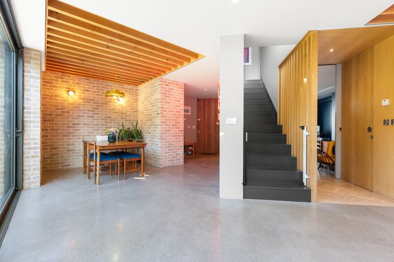 The dining area is set in an alcove