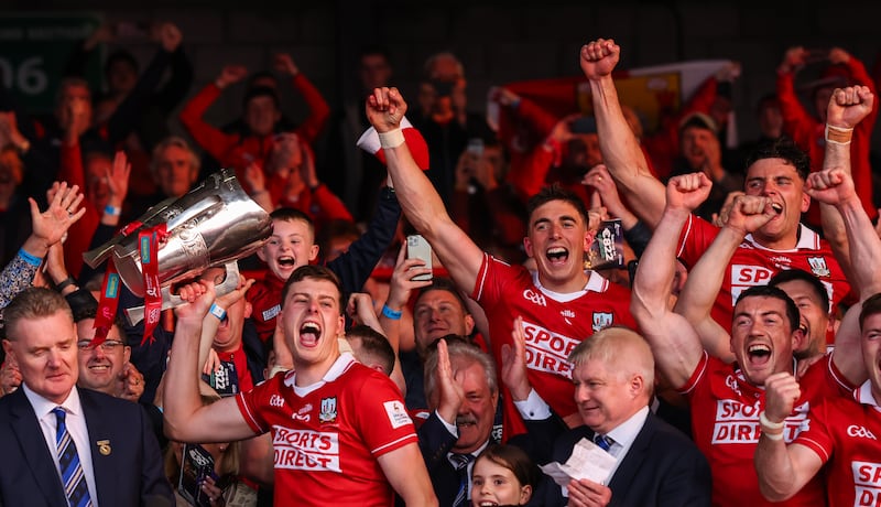 Cork's Robert Downey lifts the Munster title in 2025 after beating Limerick. Photograph: James Crombie/Inpho