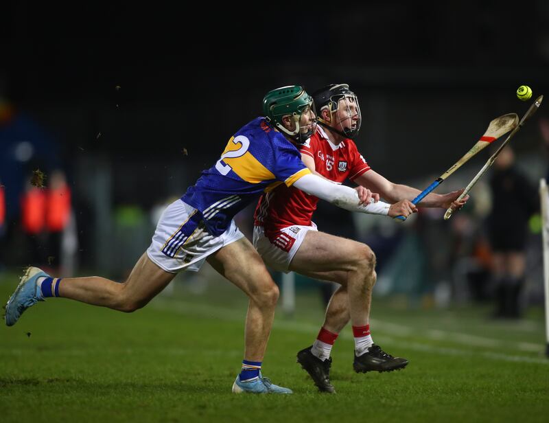 Tipperary's Robert Doyle challenges Cork's Jack O'Connor in the Saturday night league game in Thurles. Photograph: Inpho