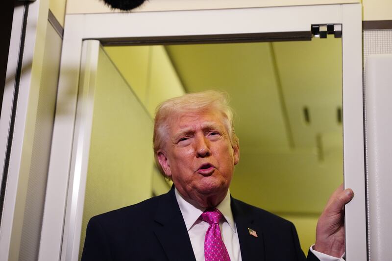 US president Donald Trump speaks to reporters aboard Air Force One as he travels from West Palm Beach to Joint Base Andrews in Maryland, March 29, 2026. Photograph: Tierney L. Cross/The New York Times
                      