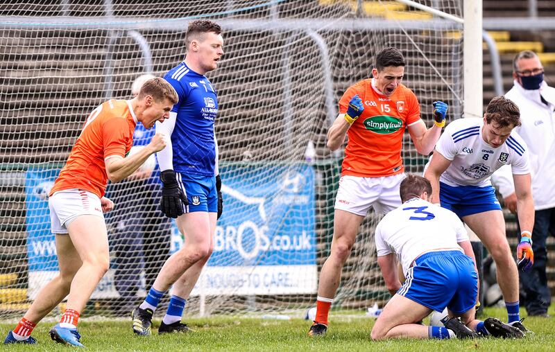 Armagh's Oisín O'Neill and Rory Grugan celebrate winning a free 
against old foe Monaghan. File photograph: Tommy Dickson/Inpho