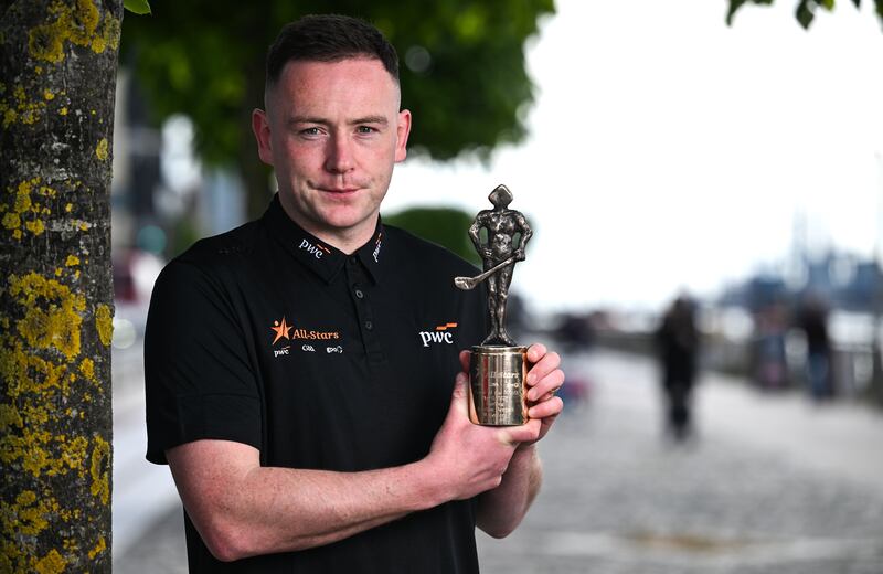 Stephen Bennett, of Waterford, with his award for hurler of the month, at PwC offices in Dublin. Photograph: Brendan Moran/Sportsfile