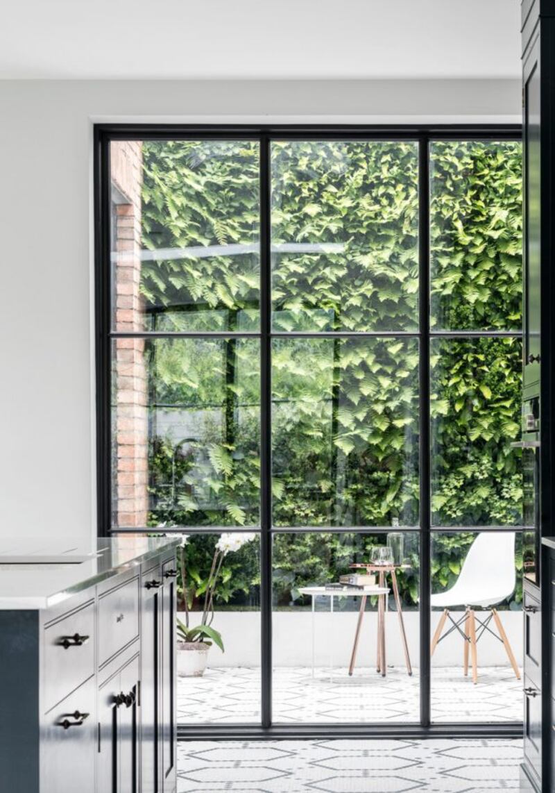 Integrating internal courtyards between old and new living spaces helps to  infuse these rooms with a bright, airy ambience while staying true to their original character. Photograph: Ruth Maria Murphy/Optimise Design