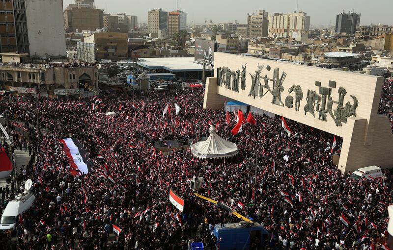 Followers of Iraq's Shiite cleric Muqtada al-Sadr wave Iraqi national flags during a protest against the joint US-Israeli strikes on Iran, as they gather in Tahrir Square, Baghdad, Iraq, April 4th. (Ceerwan Aziz - European Pressphoto Agency)