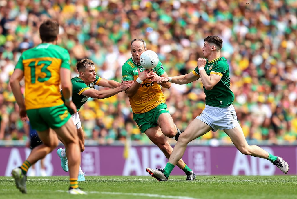 Donegal's Michael Murphy with Meath's Ruairí Kinsella and Conor Duke during the Meath vs Donegal All-Ireland Senior Football Championship Semi-Final, Croke Park. Photograph: Tom O’Hanlon/Inpho