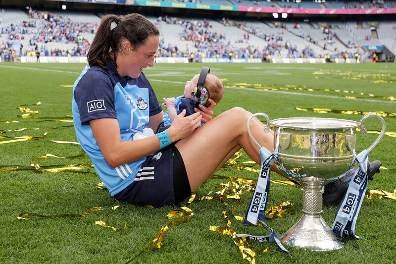 Hannah Tyrrell celebrates with her then seven-week-old daughter Aoife after Dublin beat Kerry in the All-Ireland ladies football final in August. Photograph: Laszlo Geczo/INPHO
