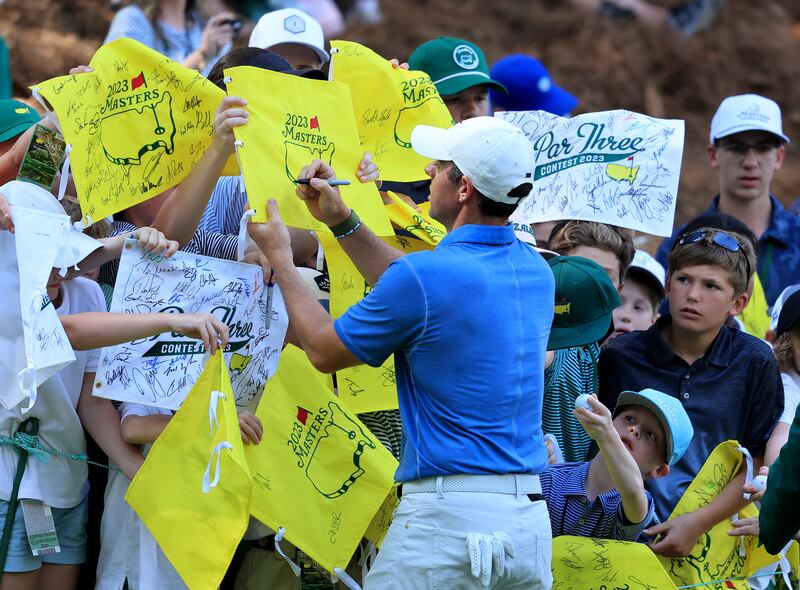 McIlroy signing autographs at the 2023 Masters. Photograph: David Cannon/Getty Images