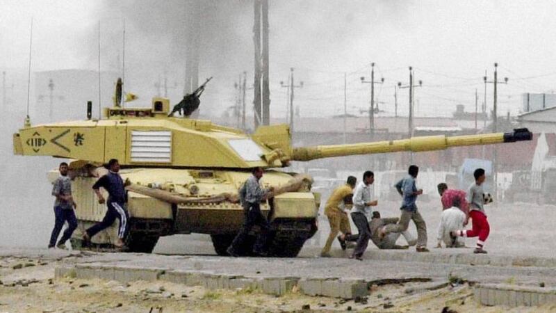 Britain’s 2 Company Irish Guards are seen  in Basra, Iraq, in 2003. Photograph:  Mirrorpix/ Getty Images