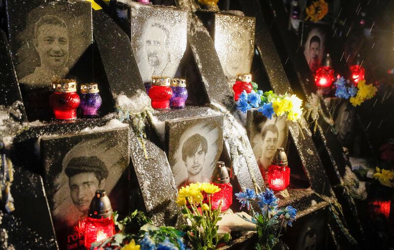 Portraits at a memorial for activists who died during the so-called Maidan revolution in 2014. Photograph: EPA