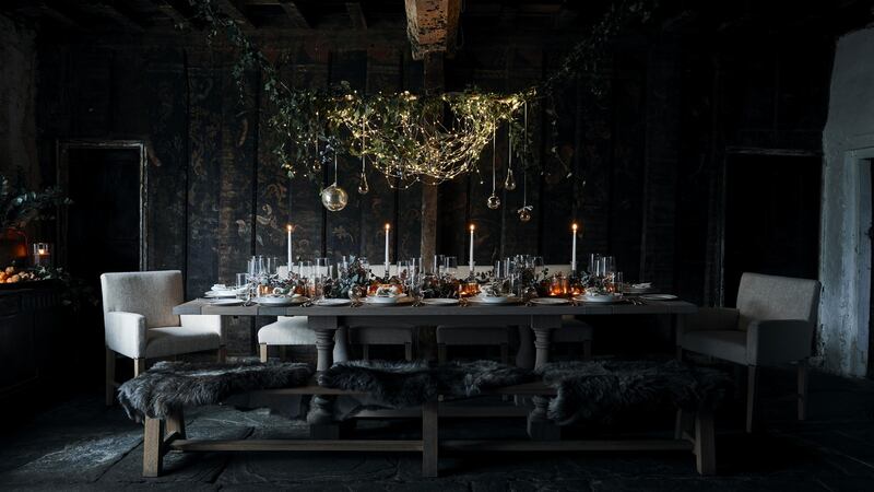 Neptune bench and table under fairy lights