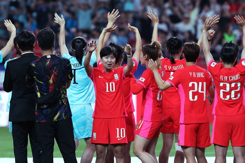 Ji So-Yun and her South Korea team. Photograph: Han Myung-Gu/Getty
