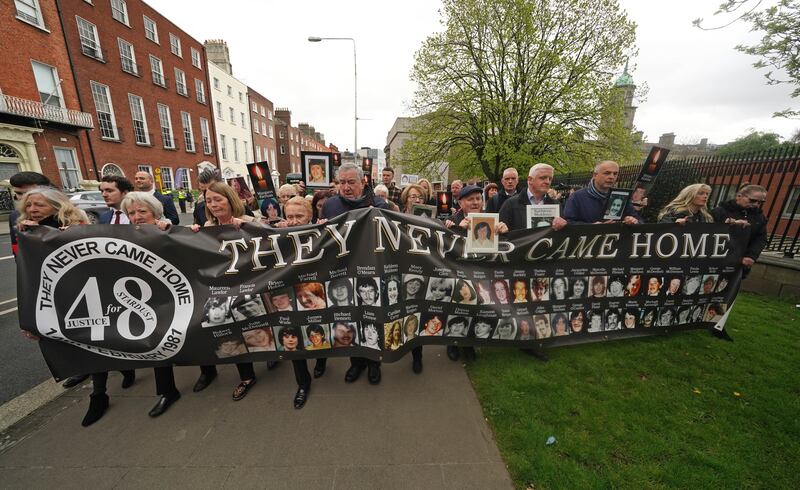 Family members walk to the Garden of Remembrance in Dublin after a verdict of unlawful killing has been returned by the jury. Photograph: Brian Lawless/PA