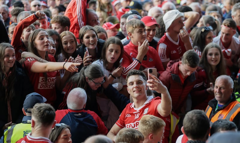 Cork's Brian Hayes takes a selfie with supporters after the Munster SHC final. Photograph: Laszlo Geczo/Inpho