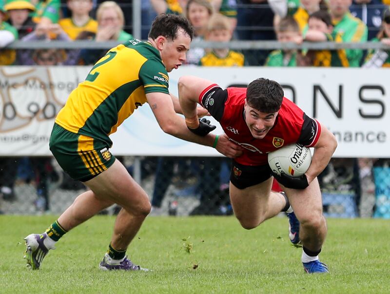 Down’s Daniel Guinness and Donegal's Caolan McColgan. Photograph: Lorcan Doherty/©INPHO