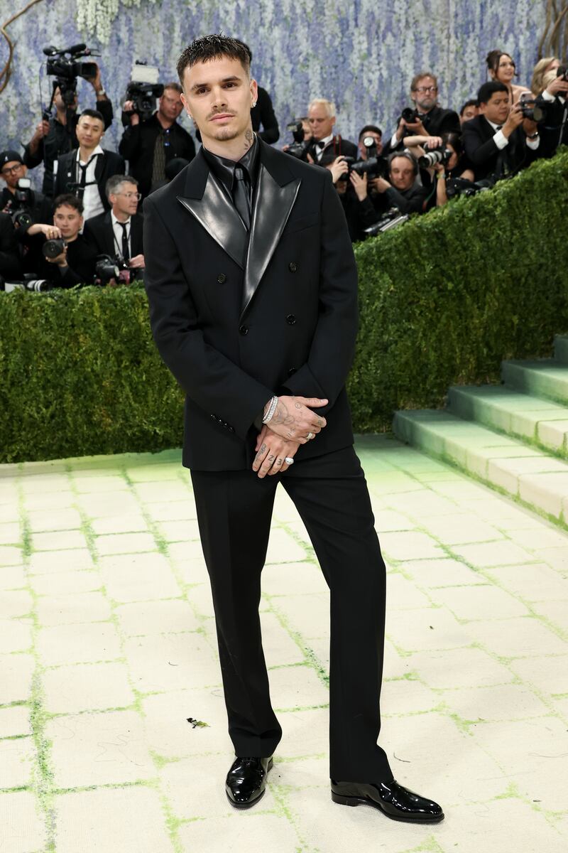 Romeo Beckham in Burberry. Phitograph: Jamie McCarthy/Getty Images)