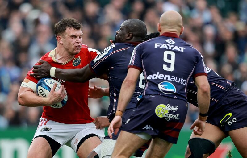 Munster's Tom Farrell takes on Mahamadou Diaby of Bordeaux. Photograph: Dan Sheridan/Inpho