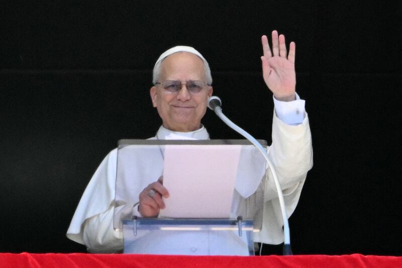 Pope Leo XIV addresses the crowd from the window of the apostolic palace overlooking St. Peter's square during the Regina Coeli prayer in The Vatican on April 6th, 2026. Photograph: Alberto PIZZOLI / AFP via Getty Images