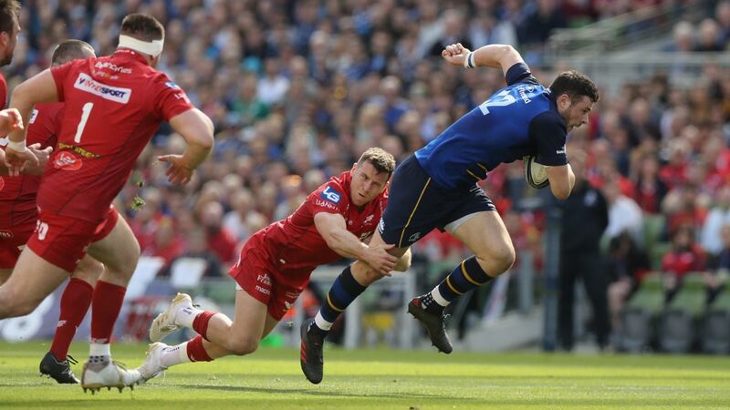 Leinster’s Robbie Henshaw  breaks clear during the Champions Cup semi-final against Scarlets at the Aviva Stadium. Photograph: David Rogers/Getty Images