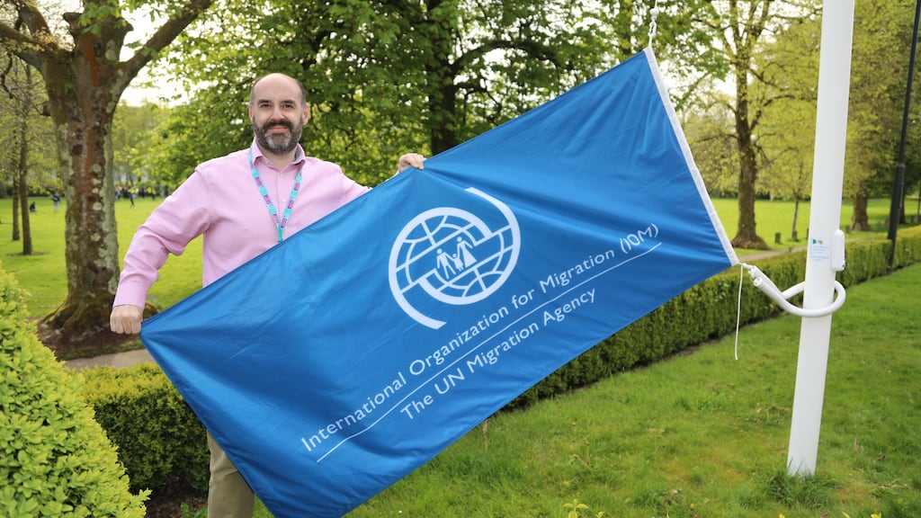 Tom Felle, head of journalism and communications at NUI Galway, at a flag raising to mark the launch of the Global Migration Media  Academy.