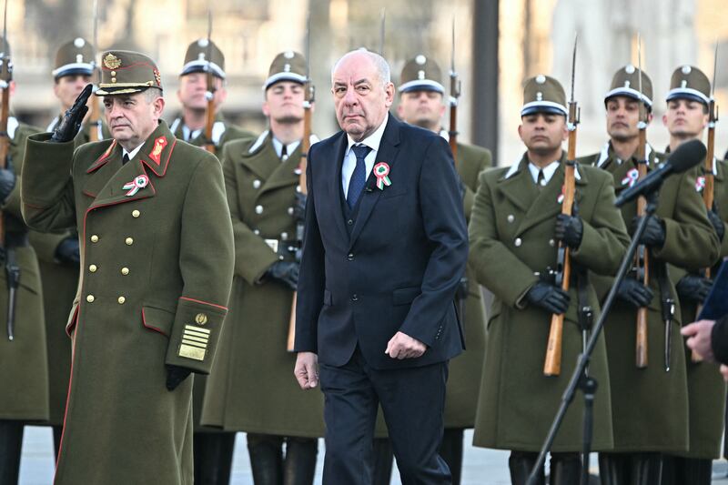 Hungarian president Tamas Sulyok  inspects a military honour guard during a flag-hoisting ceremony in front of the parliament in Budapest, Hungar. Photograph: Attila KIisbenedek/AFP/Getty Images
